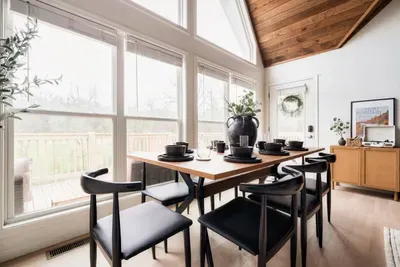 Enjoy a grand family meal at this modern dining table.