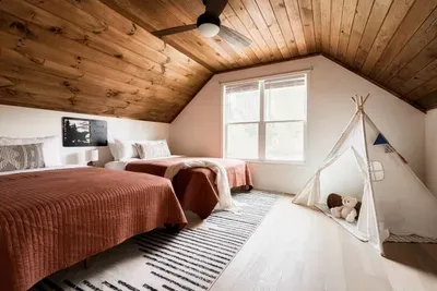 This bedroom is decorated for kids but can be enjoyed by both adults and adults alike!