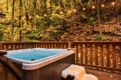 Hot tub is located in the back and is surrounded with trees and very private. You can also skinny dip :)