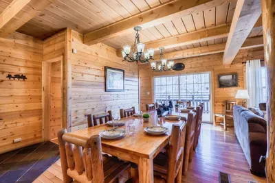 Enjoy a grand family meal at this large log dining table.