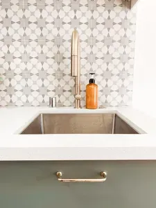 Brass fixtures have been incorporated throughout the house to go with the mediterranean vibe