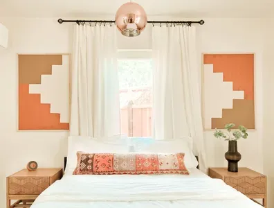 Enjoy a good night's sleep on the Queen bed. Globe light above provides a romantic setting at night.