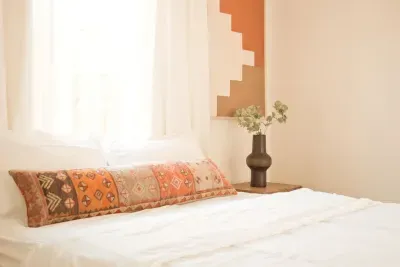 Queen bed comes with a tempur pedic mattress topper which takes the shape of the body to provide a good night's sleep.