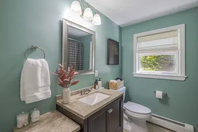 Second Floor Bathroom with full amenities and tub/shower.