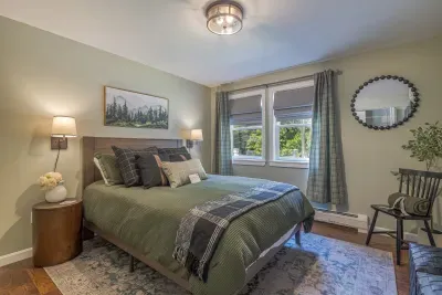 First floor bedroom with queen bed, full closet and smart tv.  The room also comes with blackout curtains for the days you want to sleep a little longer.