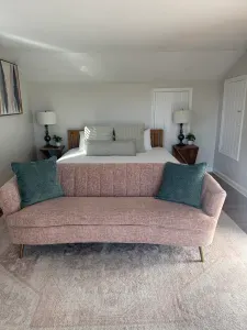 Master Bedroom with couch looking out the swan river 