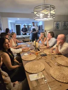 The formal dining area provides an elegant setting for group dinners, celebrations, and memorable meals together, complementing the home’s casual family-room dining area.