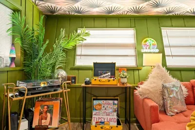Spin your favorite vinyl on the record player, browse a curated collection of classic albums, or challenge your group to games from the stocked game library.