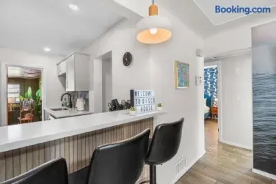 Bright modern kitchen with breakfast bar and stylish seating