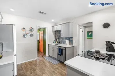 Bright modern kitchen with stainless appliances and sleek finishes