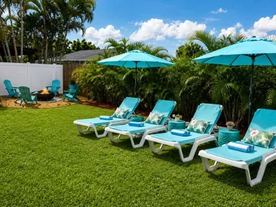 Stretch out under the sunshine, relax beneath the palms, or gather around the fire pit as the evening winds down. A peaceful outdoor retreat made for sunny days, starry nights, and unforgettable vacation moments.