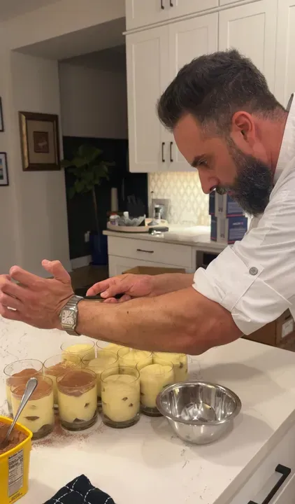 Chef John Capponi preparing desserts in a vacation home kitchen