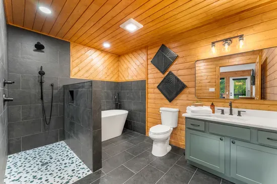 Spa-inspired bath with soaking tub, walk-in shower, and double vanity