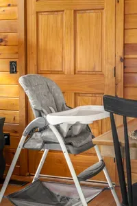 Family-friendly dining space with rustic wood interiors and high chair