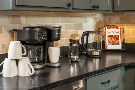 Thoughtful coffee & tea station with Keurig, kettle, and French press