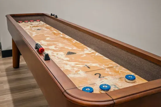 Shuffleboard table for fun and friendly games.