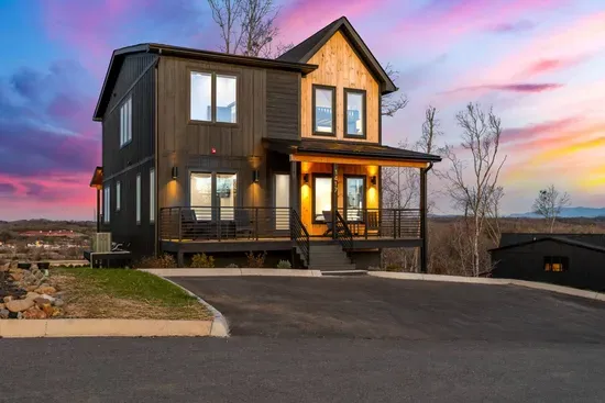Front side of the home with parking available for up to four vehicles
