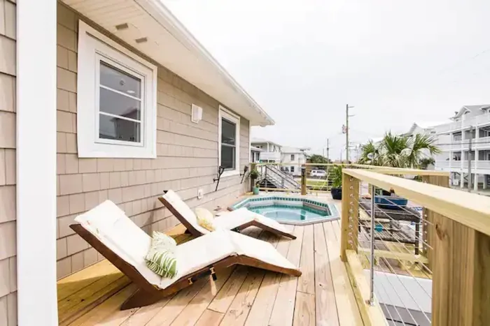 Private upper deck hot tub for post paddle/beach soaks year round