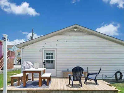 Grill, Large picnic table, umbrella and outdoor seating for fun in the sun or under the stars