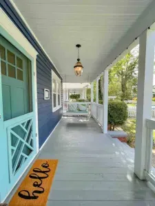 Enjoy a cup of coffee on our front porch swing