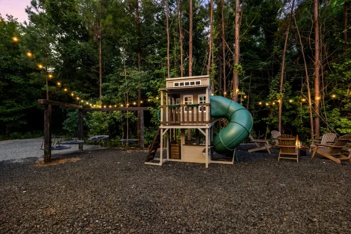Playset with slide and swings