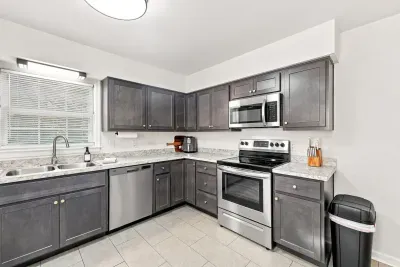 Bright modern kitchen with stainless appliances and ample counter space