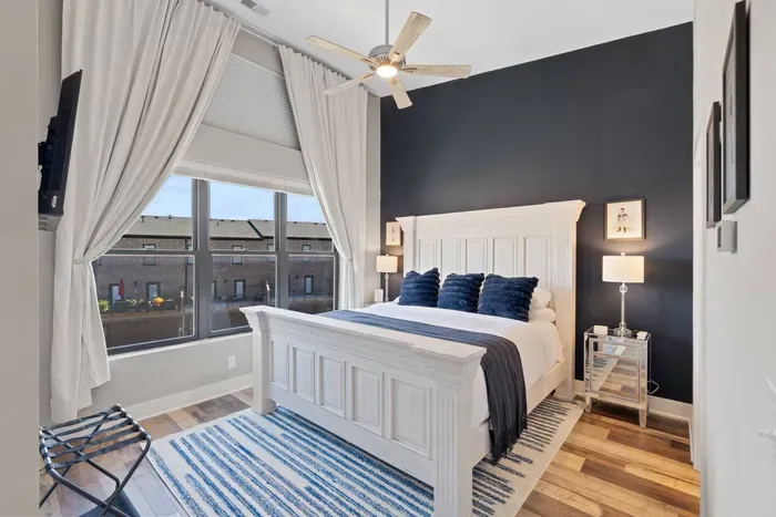 Relax in comfort in the King ensuite bedroom fully equipped with plush bedding, smart tv, and walk-in closet. Includes an ensuite bathroom for your privacy.
