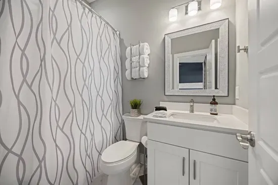 Full private bath to the queen bedroom including plush towels, shampoo, conditioner, and body wash for your convenience.