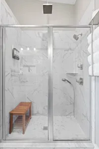 Full walk-in shower with body spray and Rainfall shower head.