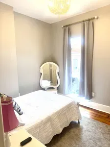 Double bed, double closet with drawer space. Access to outdoor patio off of the bedroom.