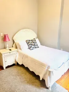 Double bed, double closet with drawer space. Access to outdoor patio off of the bedroom.