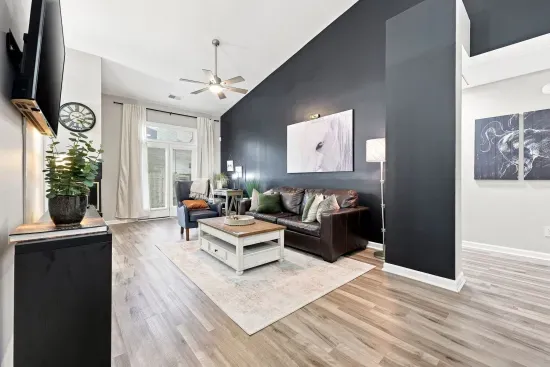 Bright modern living room with high ceilings and stylish lounge seating