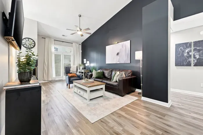 Bright modern living room with high ceilings and stylish lounge seating