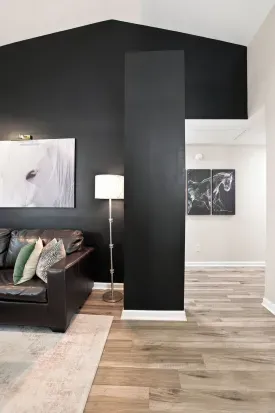 Bold modern living space with vaulted ceilings and designer touches