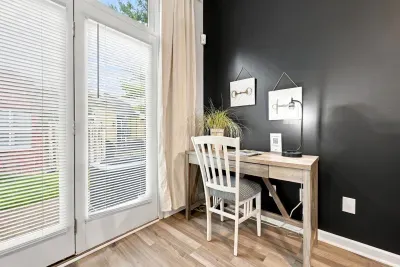 Bright work nook with desk, natural light, and sleek modern style
