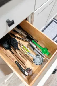 Fully stocked kitchen drawer with essential cooking tools
