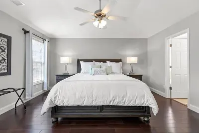 Primary suite includes plenty of dresser drawer space, a walk-in closet, full bath with double vanity. Need extra space for the little one? Pack n Play is in the closet!