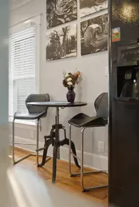 Sunny bistro nook with stylish seating for coffee or casual dining