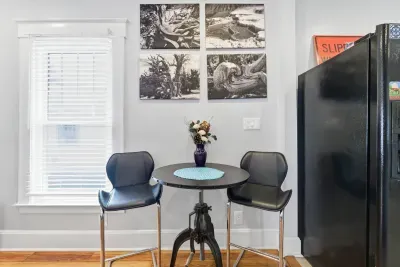 Bright bistro dining nook with stylish seating and natural light