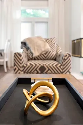 Bright, stylish living space with cozy seating and modern decor