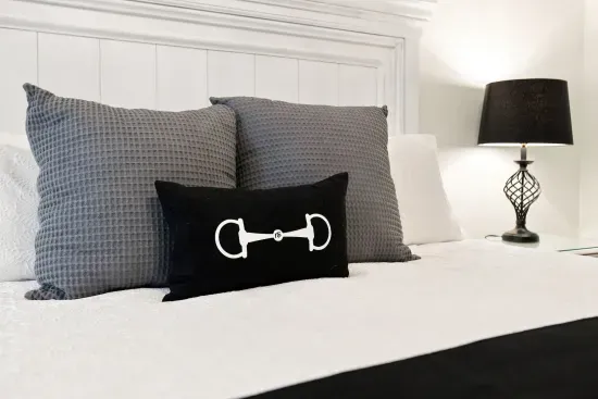 Cozy, stylish bedroom with crisp linens and elegant modern accents