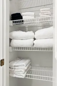 Well-stocked linen closet with fresh, fluffy towels for guest comfort