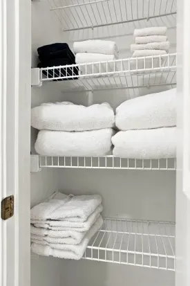 Well-stocked linen closet with fresh, fluffy towels for guest comfort