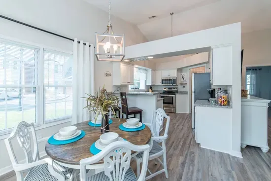 Dining table off of kitchen area