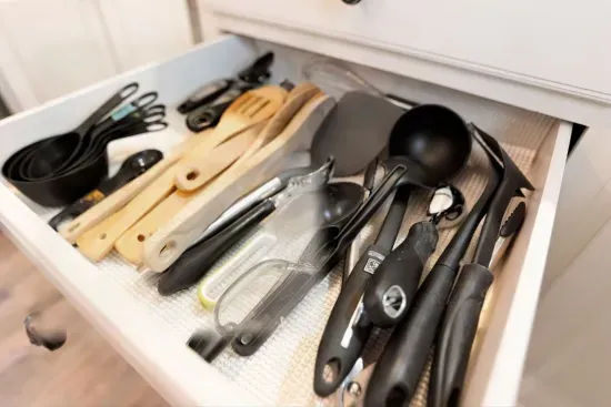 Well-stocked kitchen utensil drawer with all the essentials for easy cooking