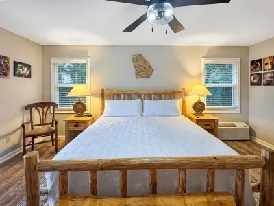 End your day here—soft linens, warm wood accents, and a quiet mountain setting designed for deep, restful sleep.