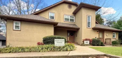 Find the Mount Yonah building tucked into a quiet corner of the gated Innsbruck community, calm and well away from the crowds.