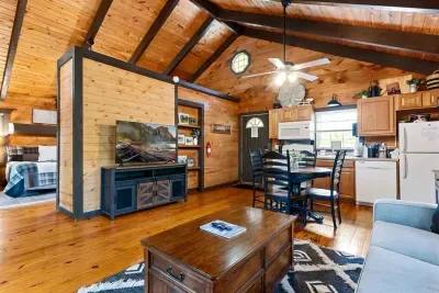 Relax beneath vaulted ceilings in the warm, wood-toned living space. Curl up with a book or stream your favorite show after a day of hiking or exploring town.