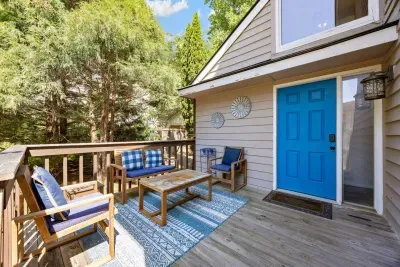 Cozy upper deck with seating—ideal for enjoying fresh mountain air.