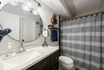 Second full bathroom featuring fresh, modern finishes and plenty of space.